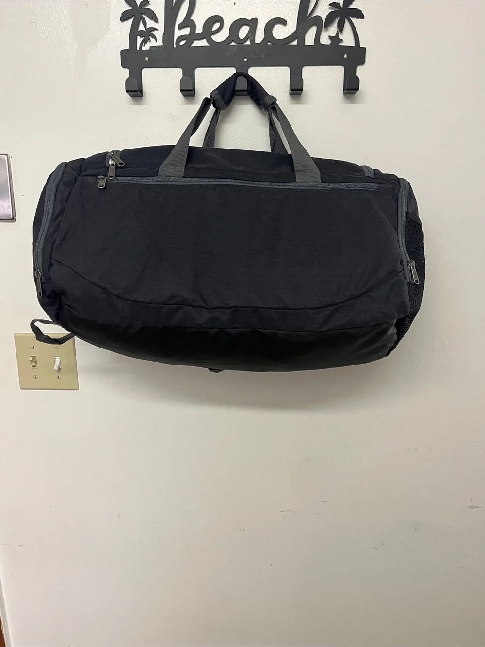 Black Duffel Bag with Red Accents
